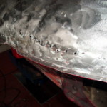 Unfallschaden im Heckbereich wird freigelegt Unfallschaden im Heckbereich wird freigelegt